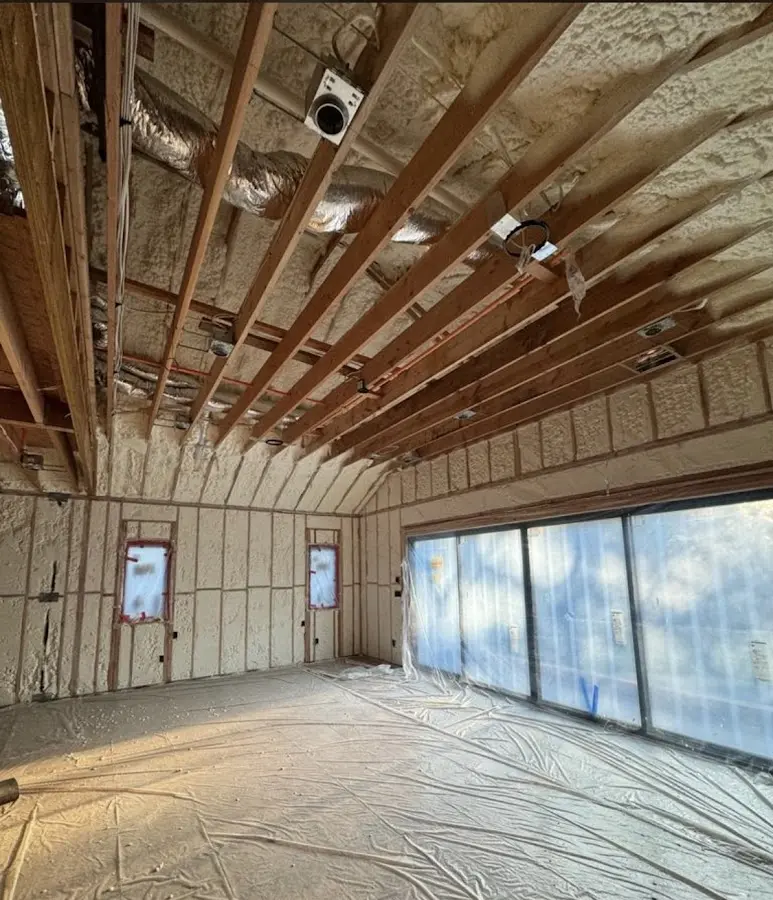 Interior walls and ceiling insulated with spray foam during new construction in Lower Moreland